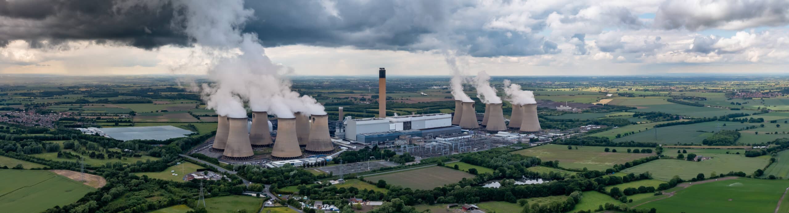 An aerial landscape view of Drax Power Station in North Yorkshire emitting carbon dioxide pollution into the atmosphere