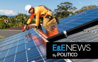 Man installing a solar panel on a hot sunny day