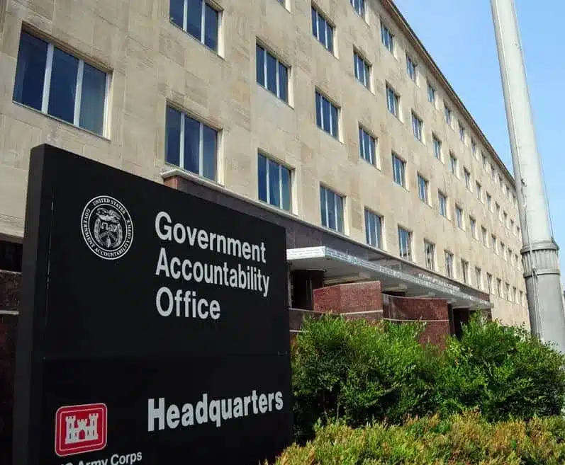 Image of USGAO and USACE sign in front of the GAO building